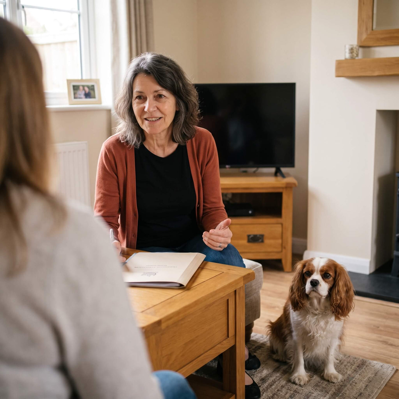 Pet sitter with a dog at a meet and greet